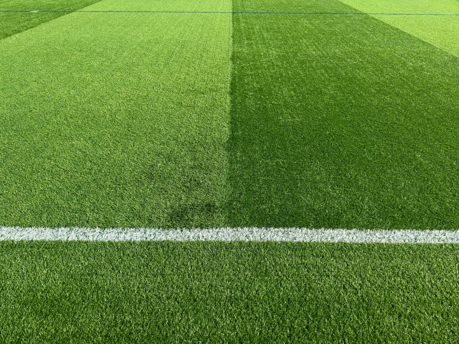 Artificial turf surface inspected for condition and maintenance needs